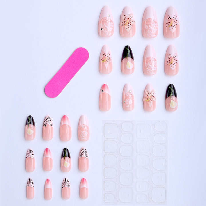 Artificial nails with creative floral designs and glitter accents Stornfield