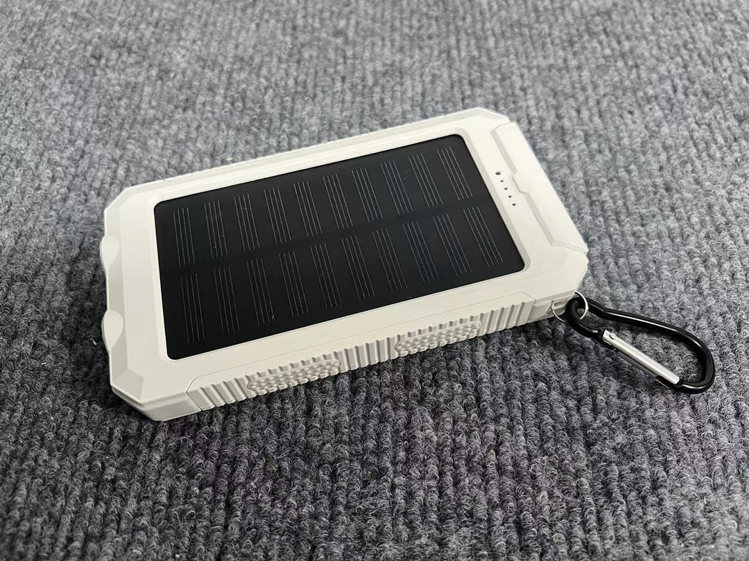 Portable solar power bank with integrated charging plug function Stornfield