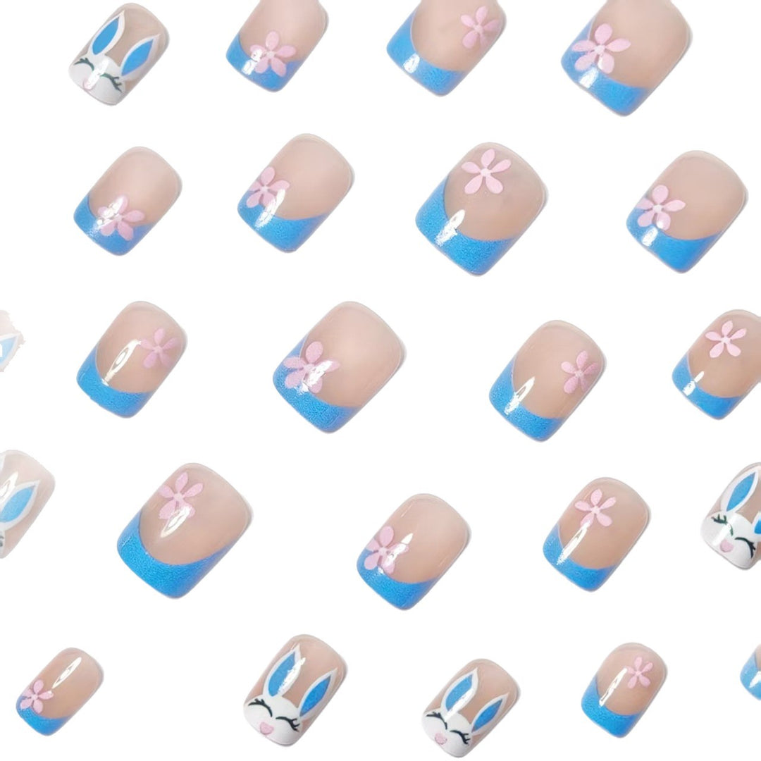 Creative nail art with cheerful bunny and flower pattern Stornfield