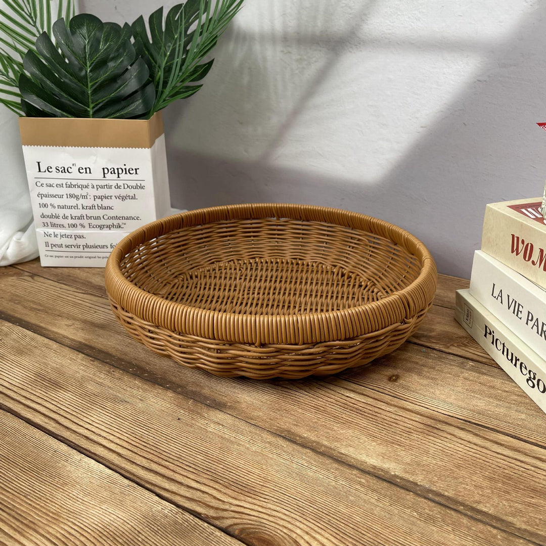 Women’s round serving basket made of woven rattan Stornfield
