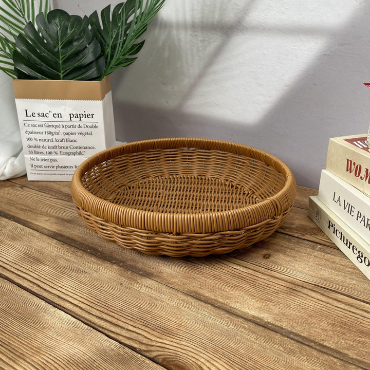 Women’s round serving basket made of woven rattan Stornfield