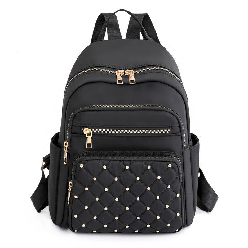 Quilted Backpack with Decorative Studs Stornfield