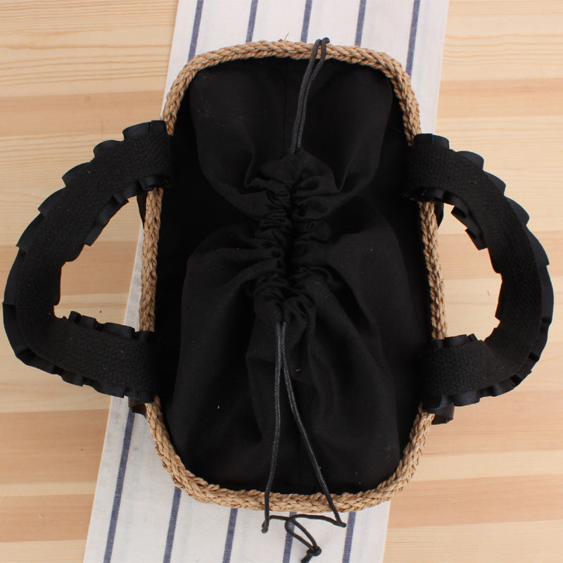 Playful basket bag with elegant fabric handle Stornfield
