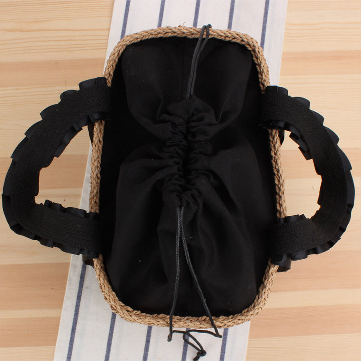 Playful basket bag with elegant fabric handle Stornfield