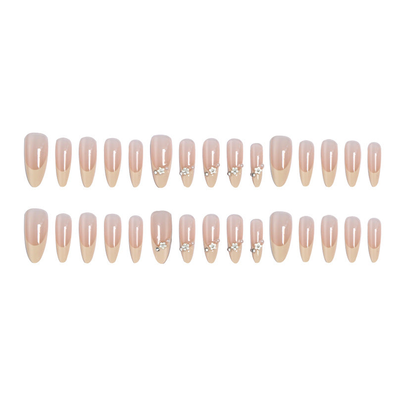 Acrylic nail set with elegant tips and sparkling appliqués Stornfield
