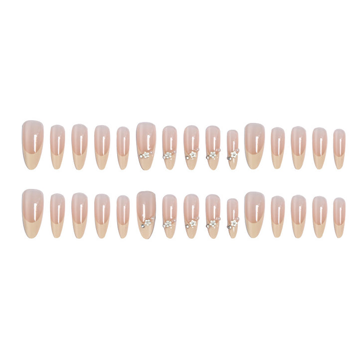 Acrylic nail set with elegant tips and sparkling appliqués Stornfield
