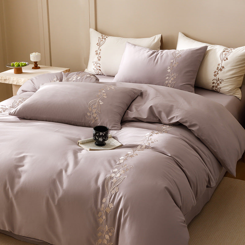 Embroidered bedding set made of cotton satin with floral vine embroidery