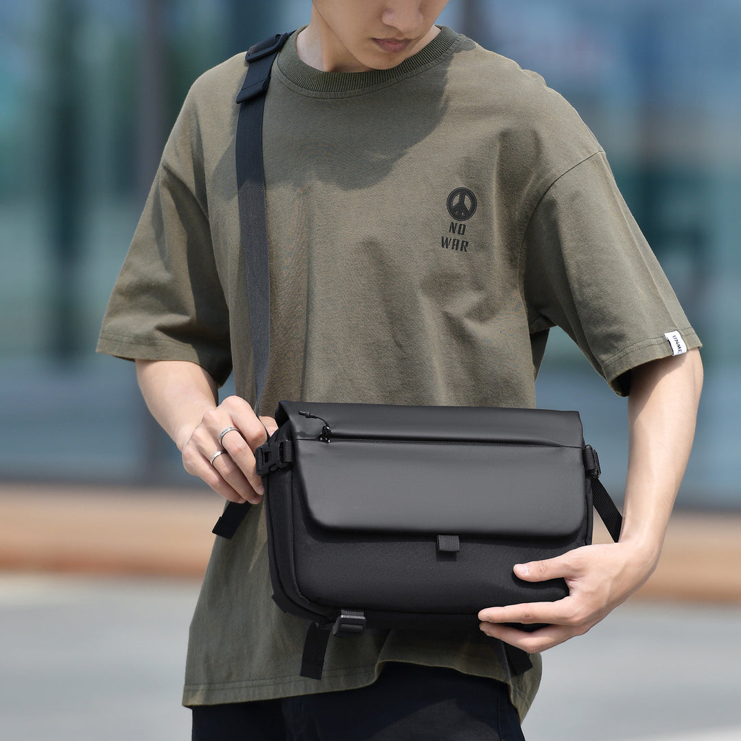 Messenger bag with versatile compartments and water-repellent material Stornfield