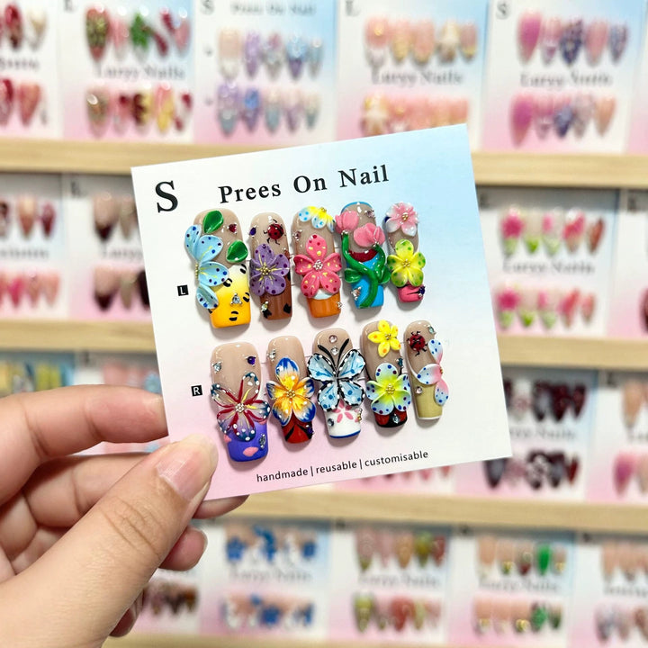 Artistic Press-On Nail Art Set with Vibrant Flower and Butterfly Designs