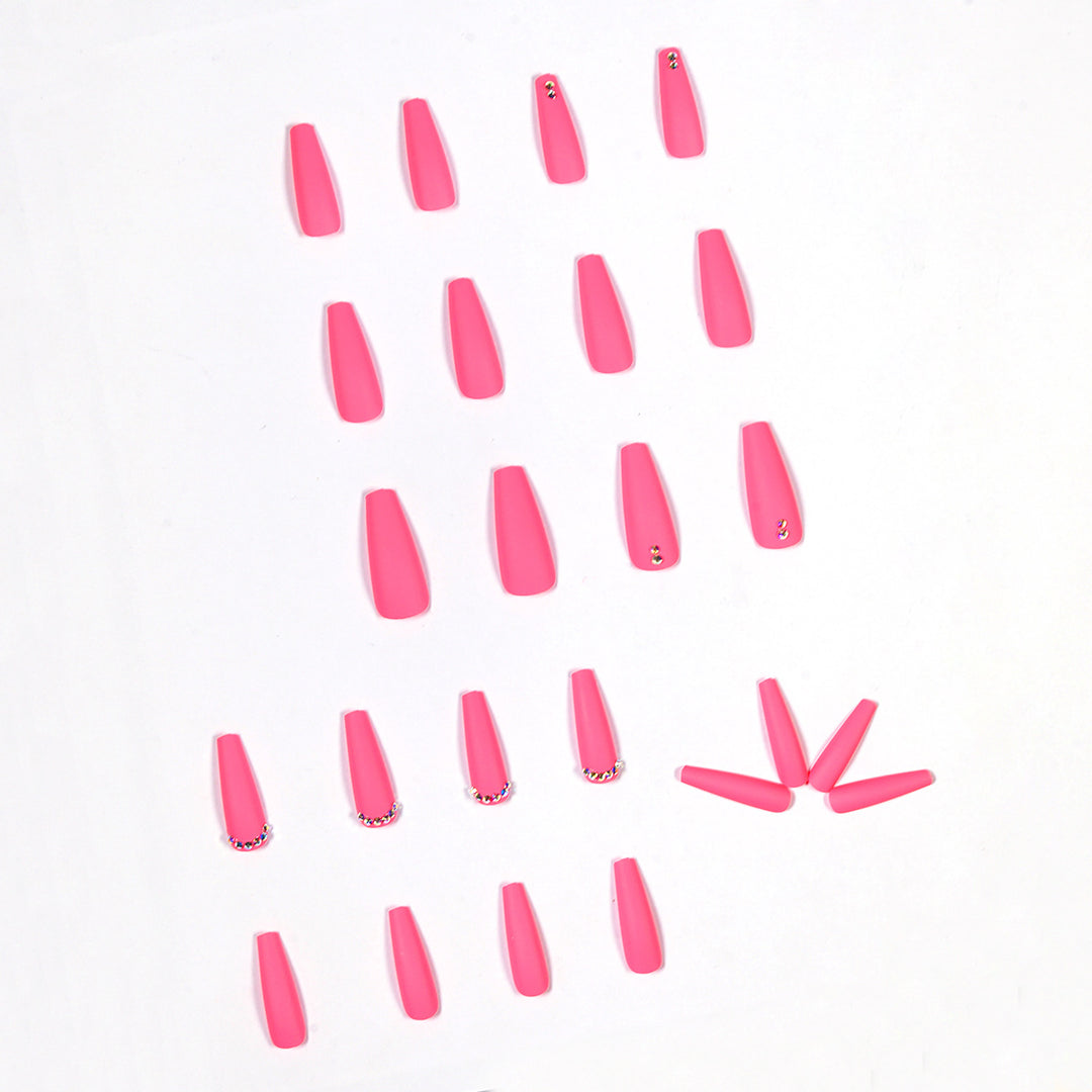 Artificial nail extensions with glitter accents Stornfield