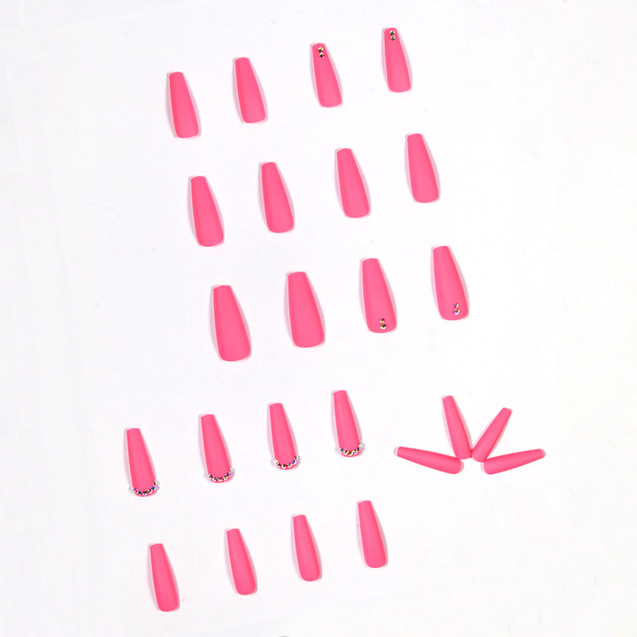 Artificial nail extensions with glitter accents Stornfield