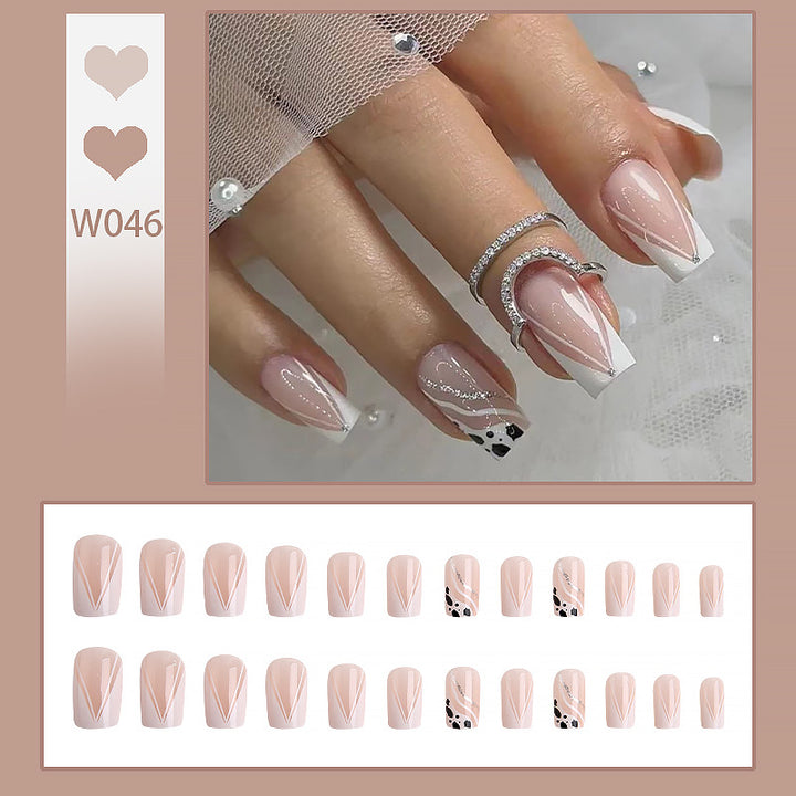 Artificial nails with elegant French design and glitter details Stornfield