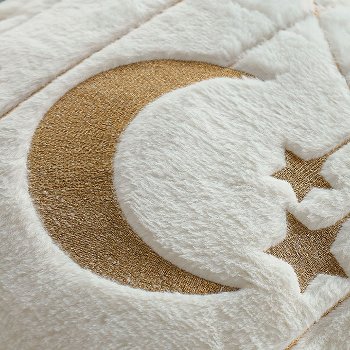 Cuddle pillow with star and moon motif