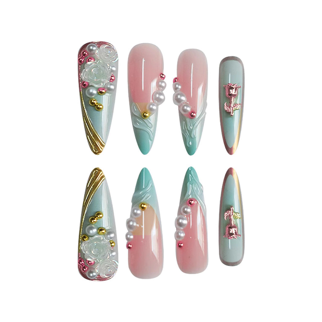 Luxurious Stiletto Nail Enhancements with Floral Accents Stornfield