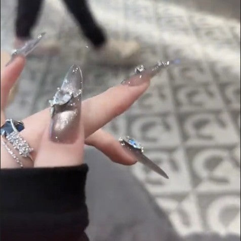 Glamorous artificial nails with rhinestone accents Stornfield