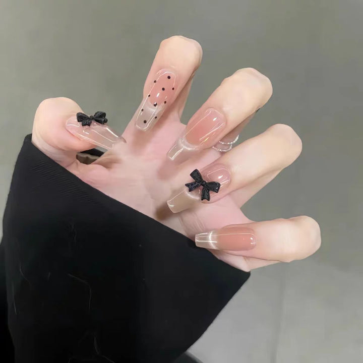 Artistic nail tips with playful motifs Stornfield