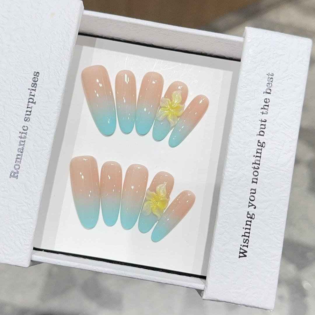 Artificial nails with enchanting ombre effect and floral accents Stornfield