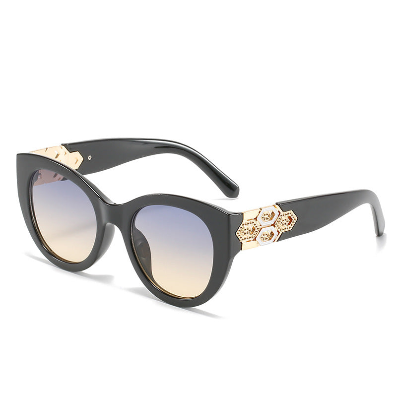Fashion-Forward Cat-Eye Sunglasses with Decorative Accents Stornfield