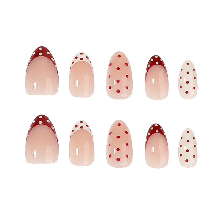 Artful stiletto nails with cute dots and accentuated color gradients Stornfield
