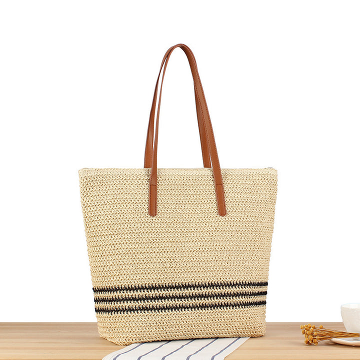 Braided beach bag with leather handles Stornfield