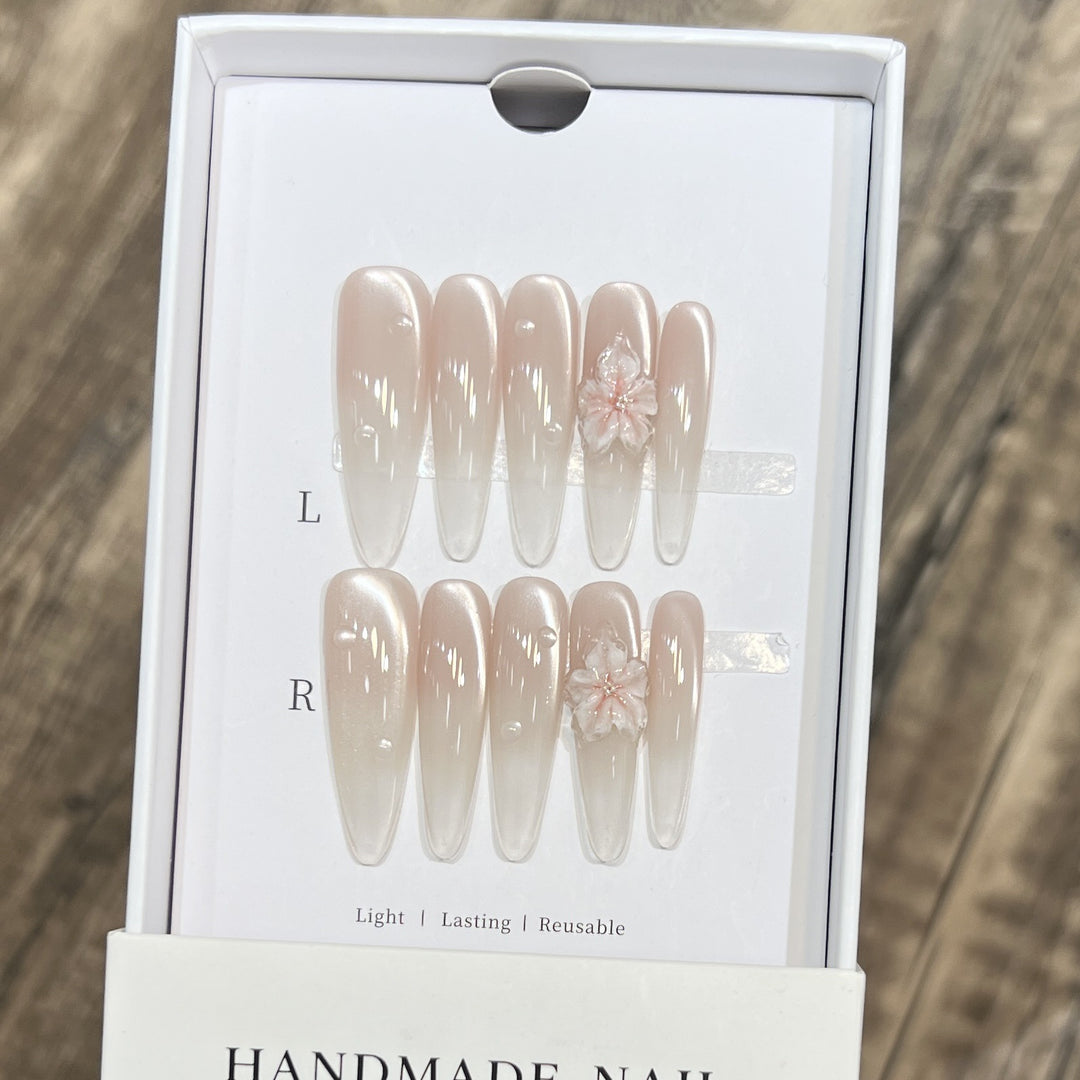Elegant Stiletto Nail Extensions with Floral Accents Stornfield