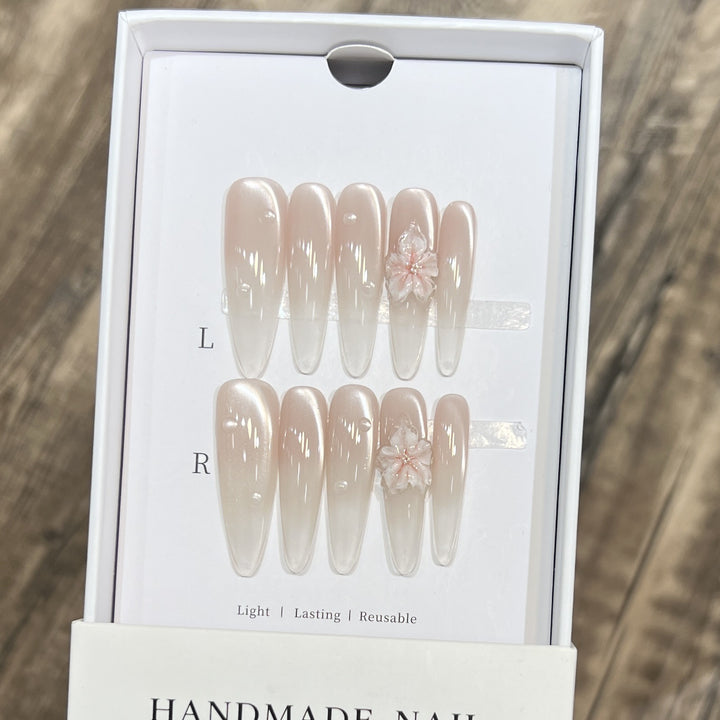 Elegant Stiletto Nail Extensions with Floral Accents Stornfield