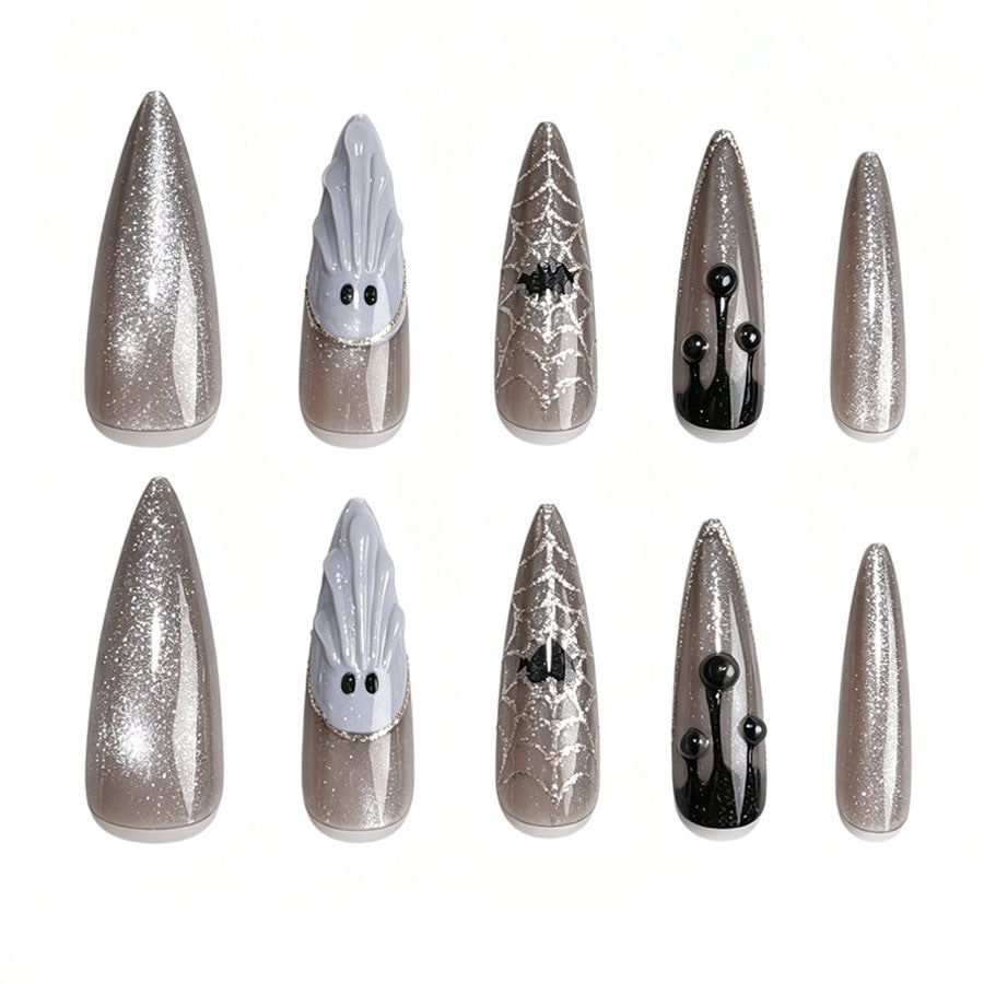 Artificial nail set with glamorous metallic elements and delicate details Stornfield