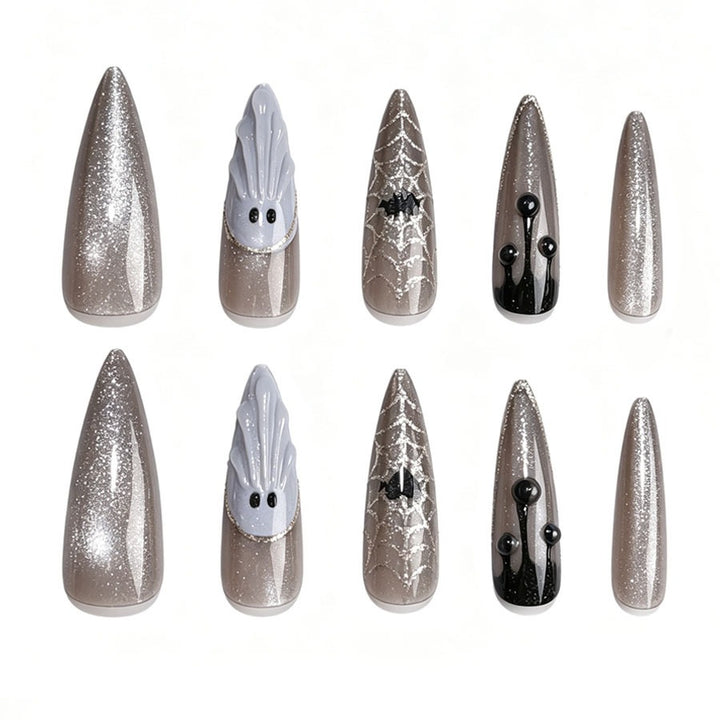 Artificial nail set with glamorous metallic elements and delicate details Stornfield
