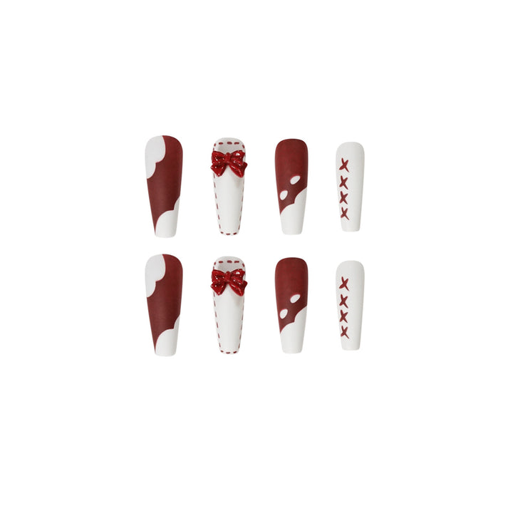 Artful stiletto nails with decoration and glitter Stornfield
