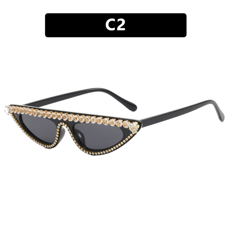 Ladies designer sunglasses in stylish cat-eye design with glittering frame Stornfield