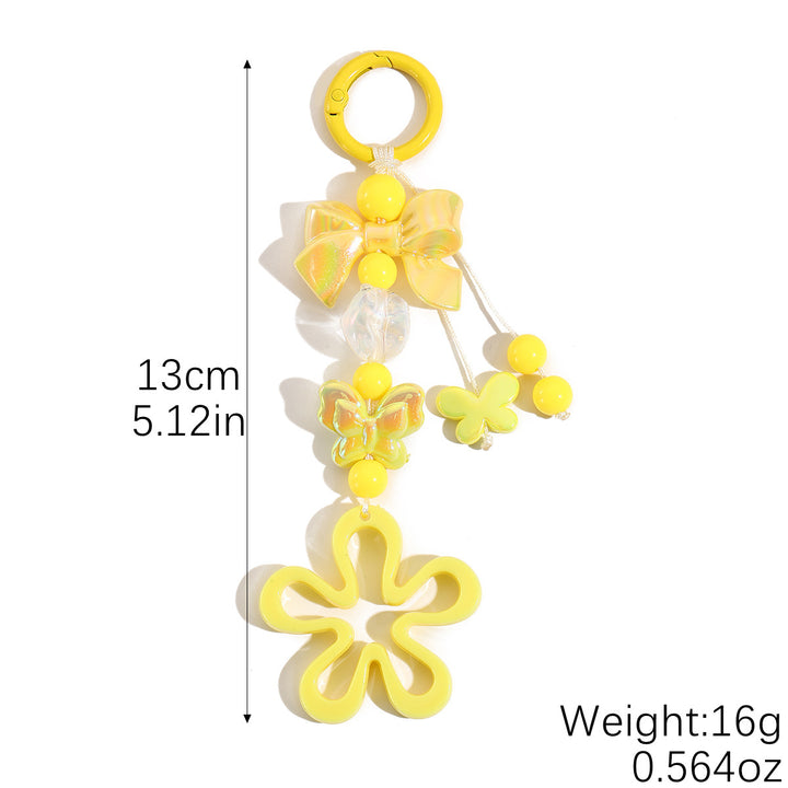 Playful keychain with flower and butterfly details Stornfield
