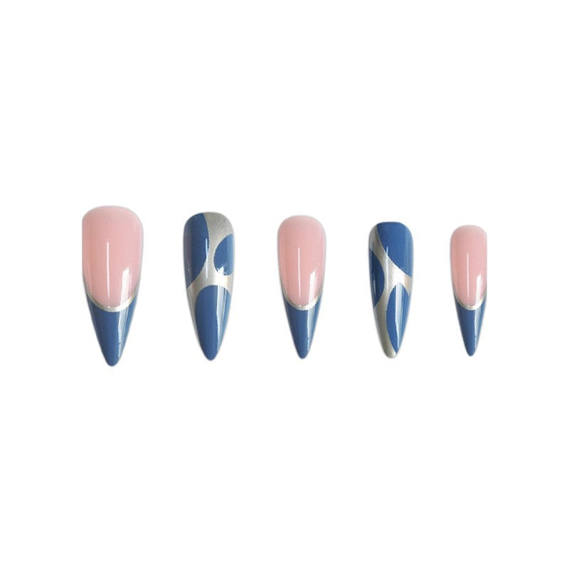 Artistic Stiletto Press-On Nail Design with Metallic Trim Stornfield