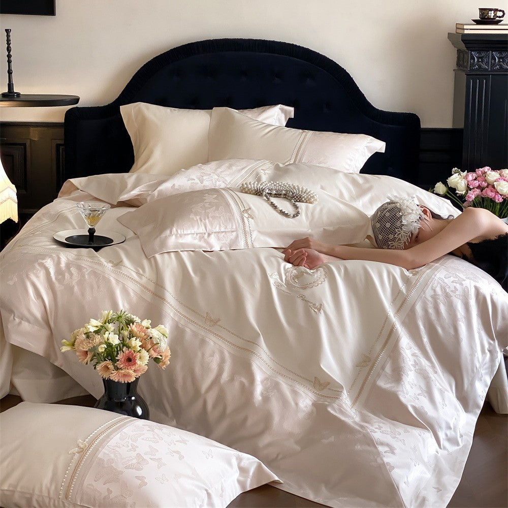 Elegant satin bedding set with pearl border, jacquard floral and butterfly pattern