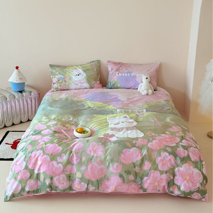 Children's bedding set with applied cat detail, watercolor flower print, and extra soft cotton blend