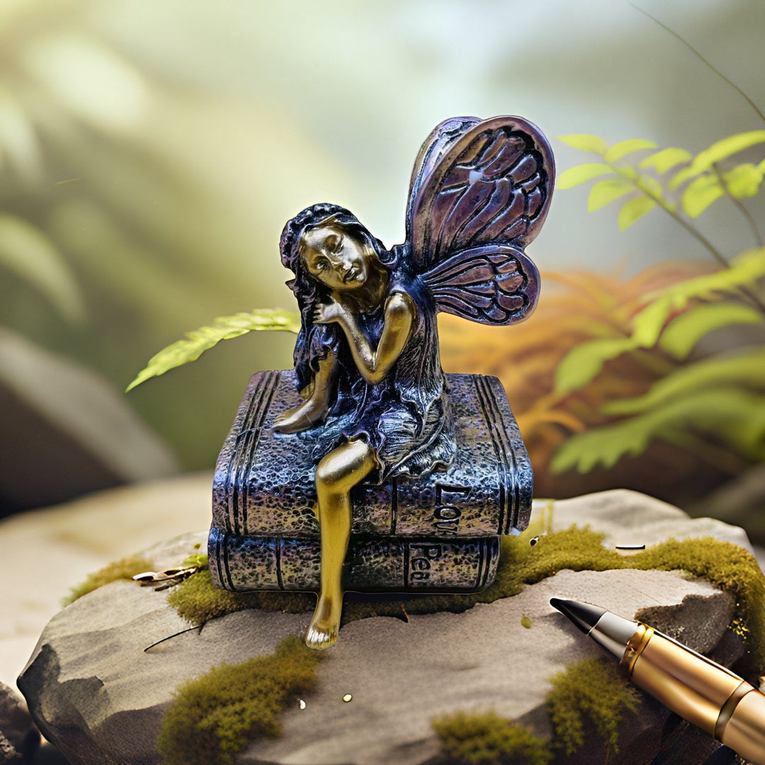 Fairy Figurine Sitting on Books Stornfield