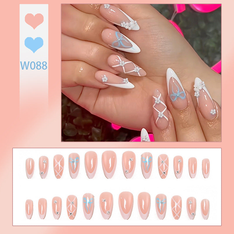 Elegant artificial nails with floral and decorative details Stornfield