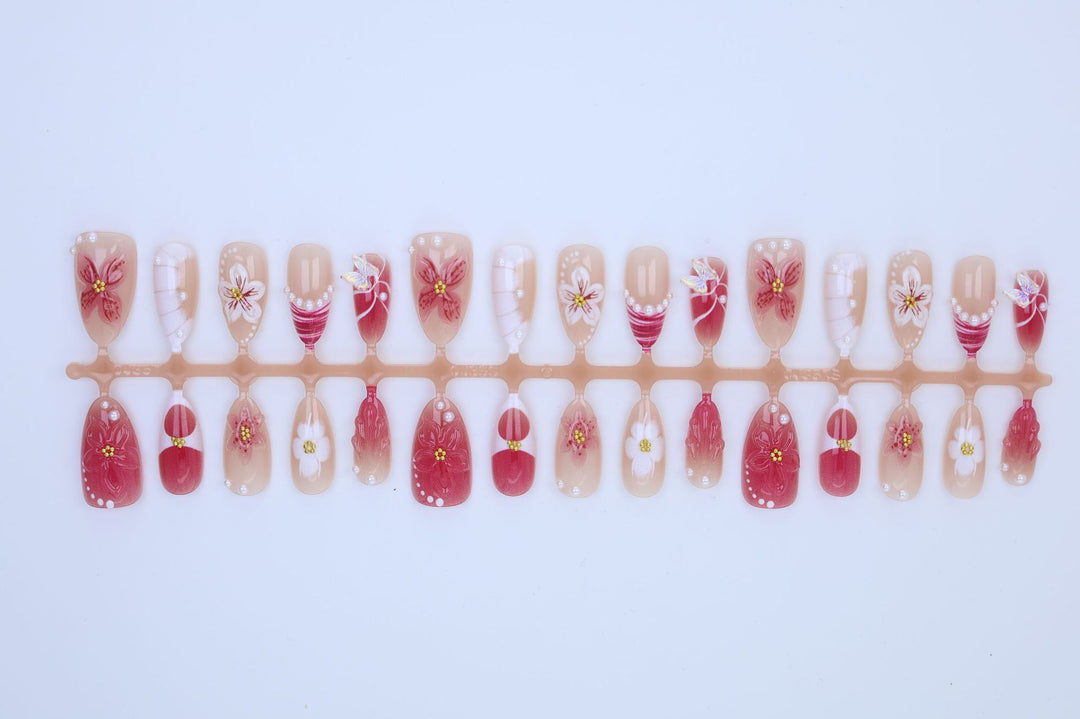 Artificial nail set with floral patterns Stornfield