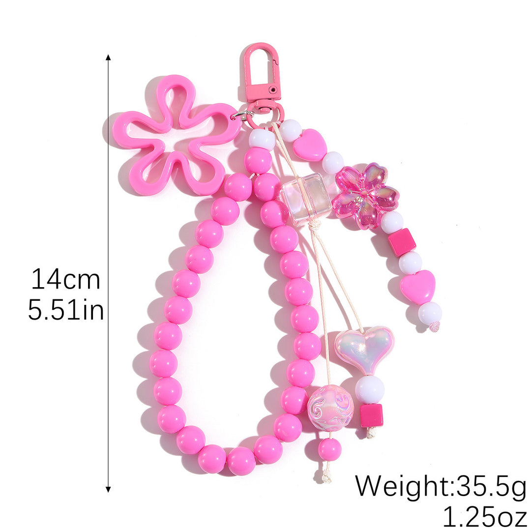 Playful keychain with flower and butterfly details Stornfield
