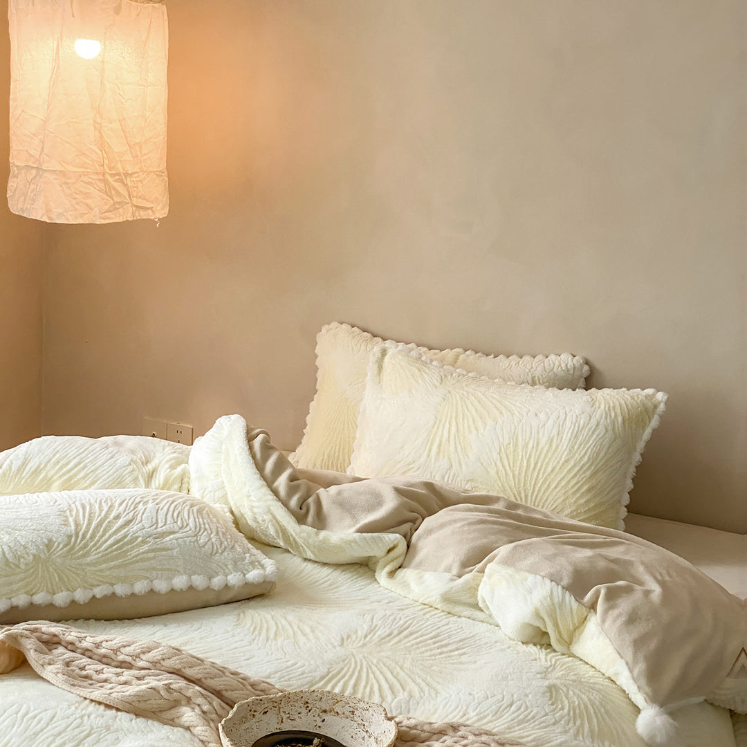 Cozy microfiber bedding set with jacquard floral relief and pompom edge