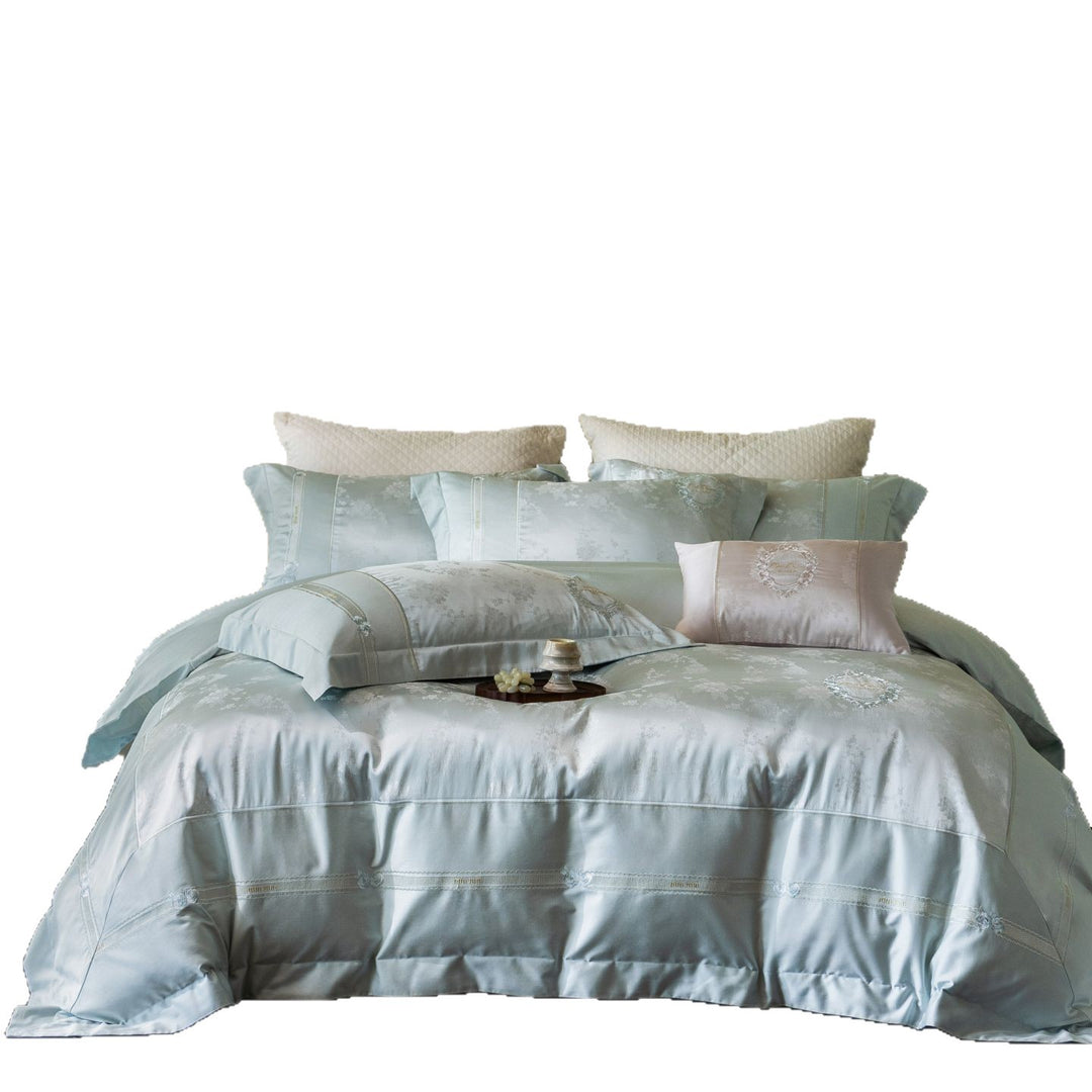 Luxurious satin bedding set with embroidered medallions and elegant quilting