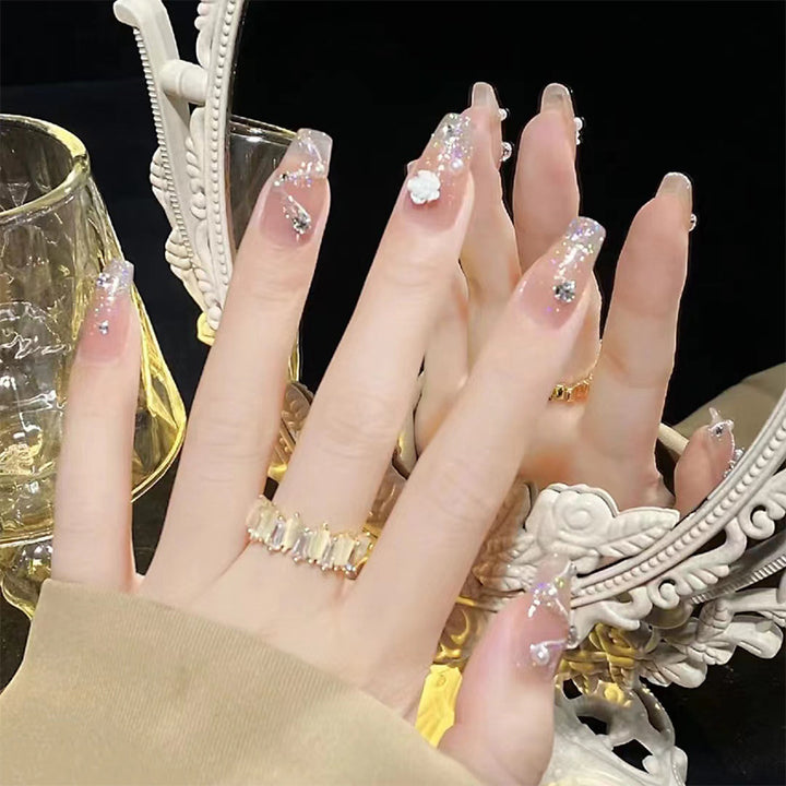 Stylish art false nails with heart design and glitter Stornfield