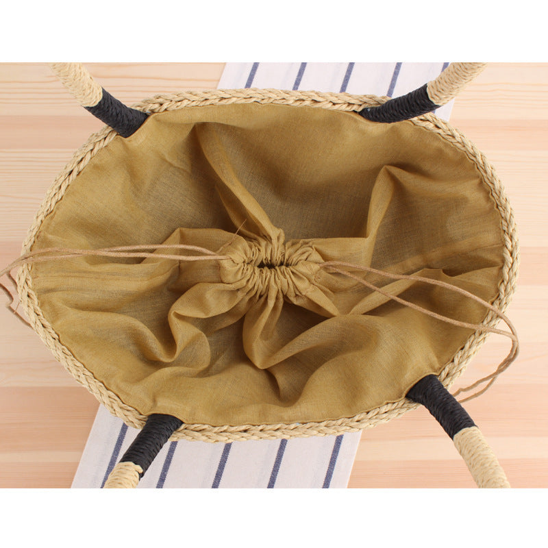 Braided beach bag with wide carrying handle Stornfield