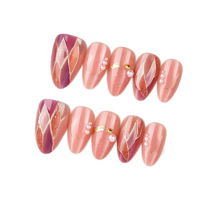 Artificial nails with elegant pearl and gold accents Stornfield