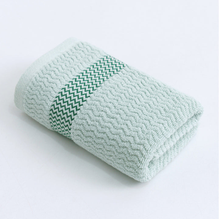High-quality terry towel with dense pile and decorative zigzag border