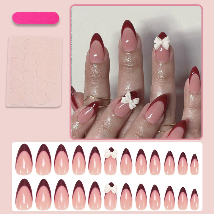Acrylic nail set with elegant lace design and romantic bows Stornfield