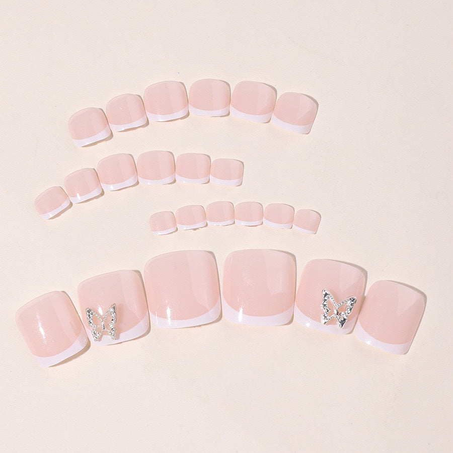 Artificial Nail Set with elegant French design and glitter accents Stornfield
