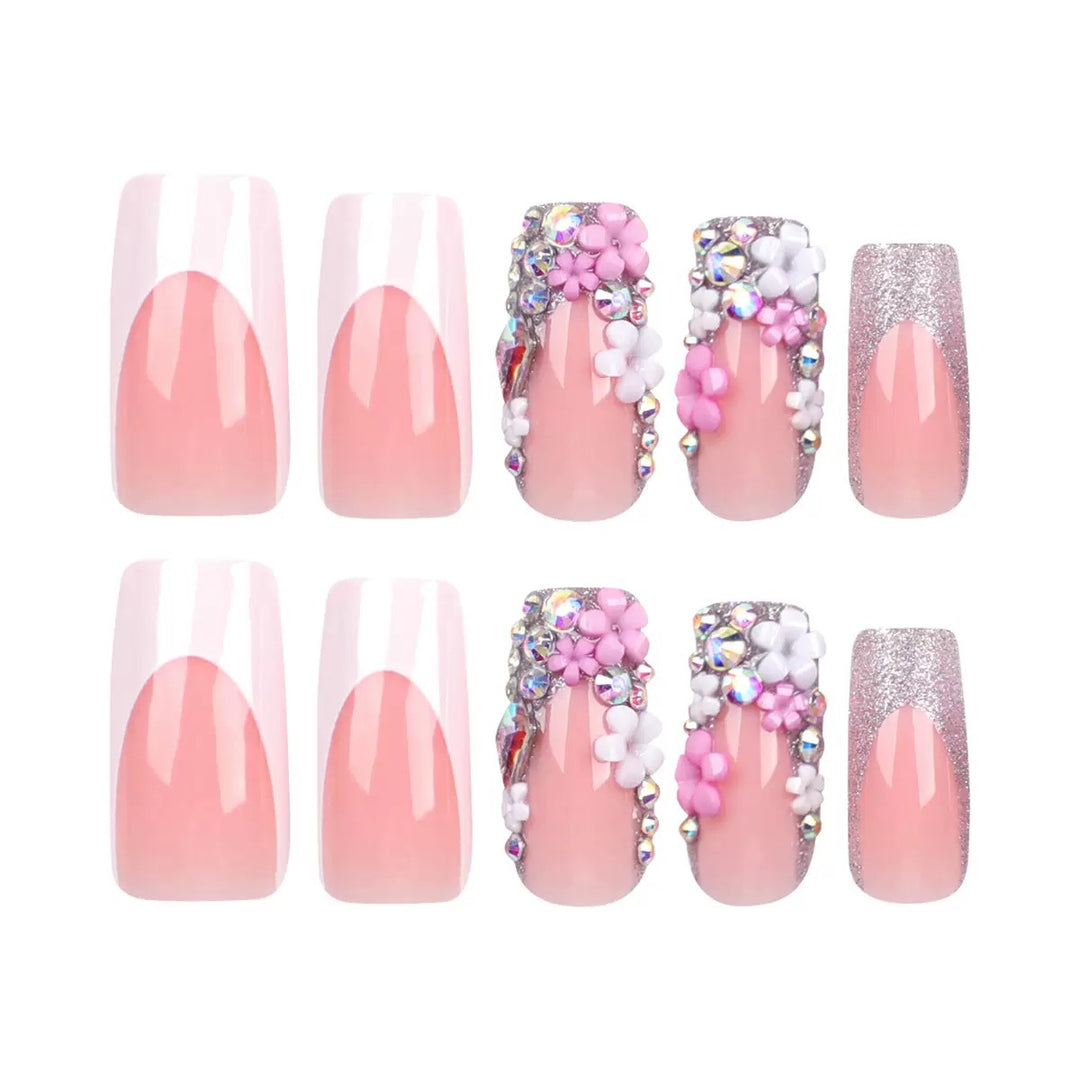 Artificial nail set with elegant 3D flowers and glitter embellishments Stornfield