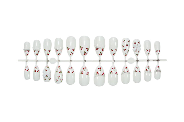 Artificial nail set with floral cherry motifs and elegant ribbons Stornfield