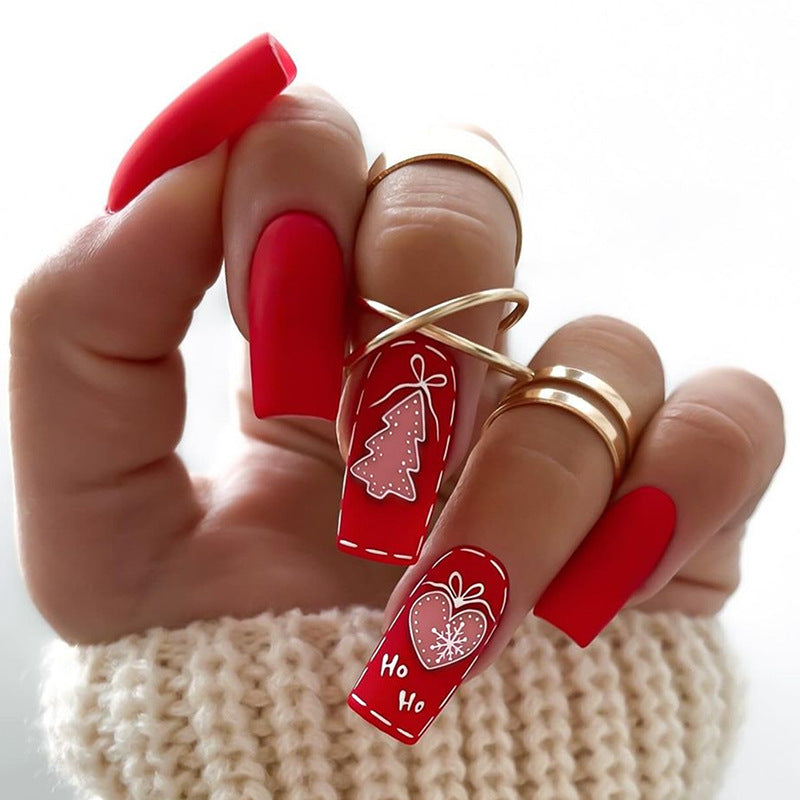 Christmas nail art set with festive motifs and glitter accents Stornfield