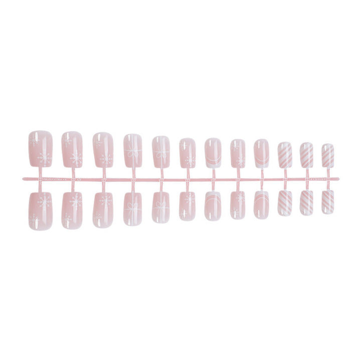 Nail set with elegant floral and striped designs Stornfield